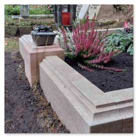 Detailansicht einer profilierten Einfassung aus regionalem Naturstein.